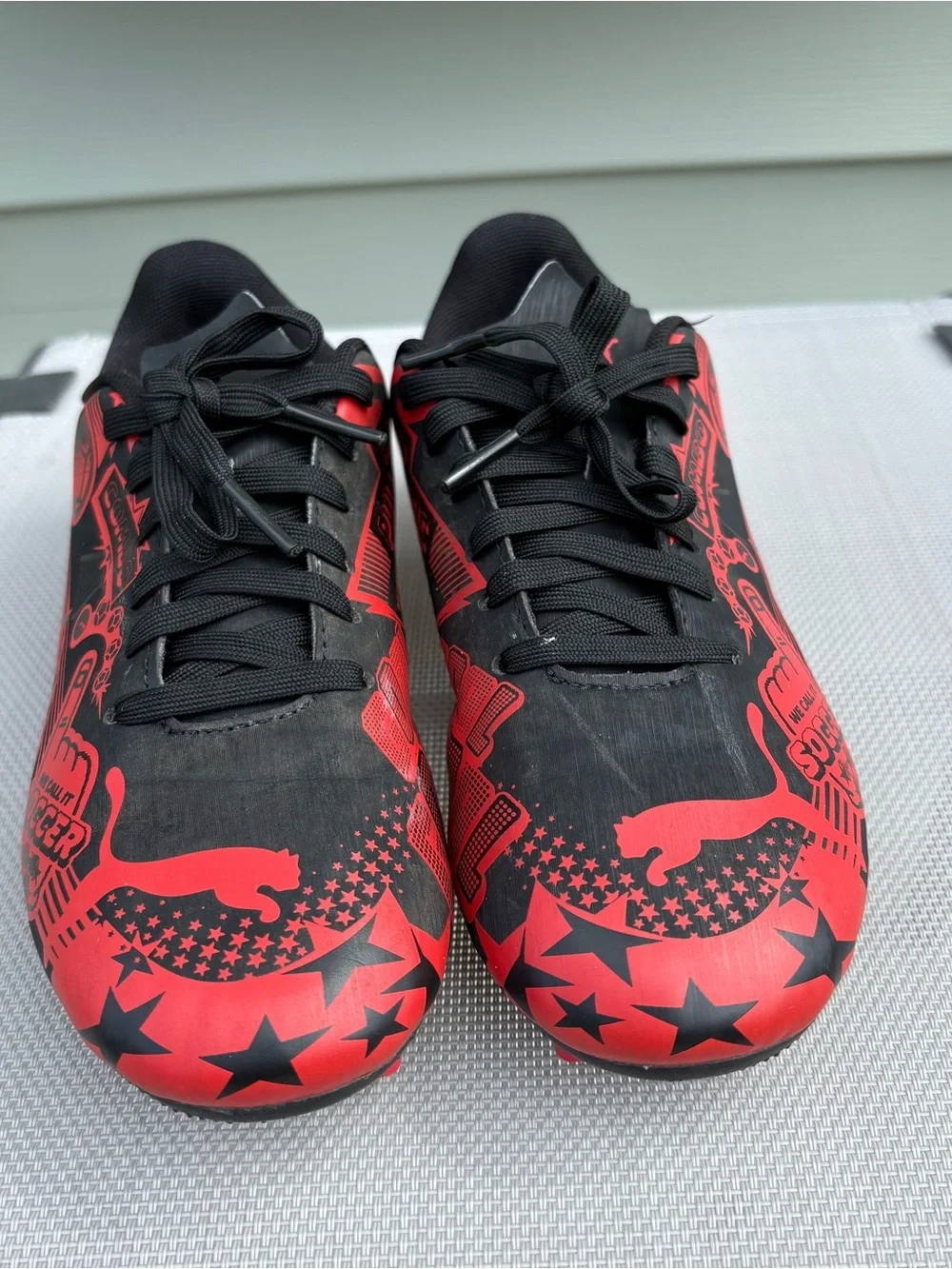 Kids Black and Red Soccer Cleats - Youth Athletic Shoes